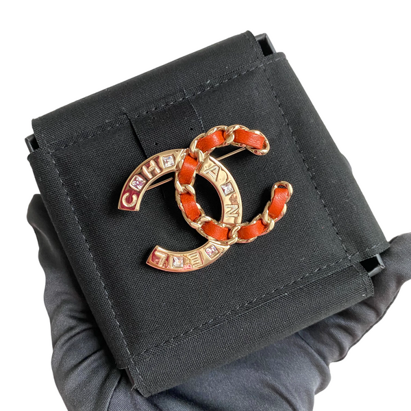 CHANEL Red Leather Threaded Chain Crystal CC Logo Brooch - Replica Handbags Shopping
.com