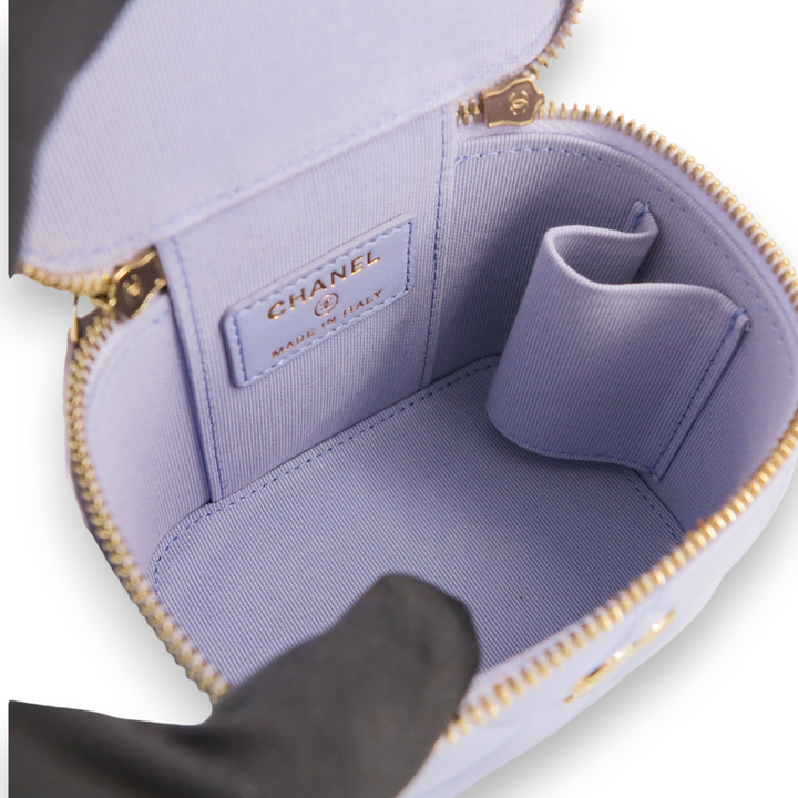 CHANEL Mini Vanity Case with Top Handle in 21K Lilac Lambskin - Replica Handbags Shopping
.com